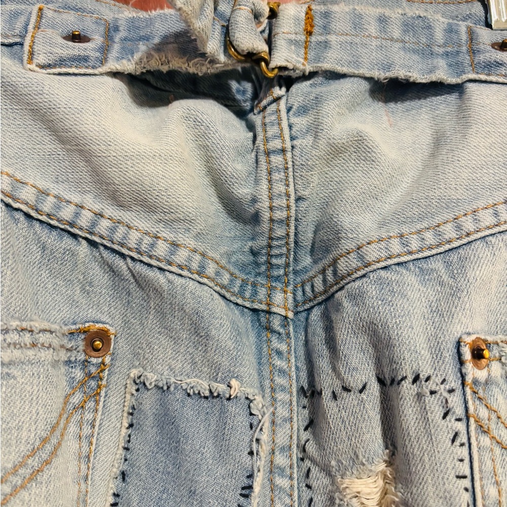Magnolia Pearl Faded Blue Denim jeans.